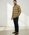 Chemise beige avec carreaux jaune et noir